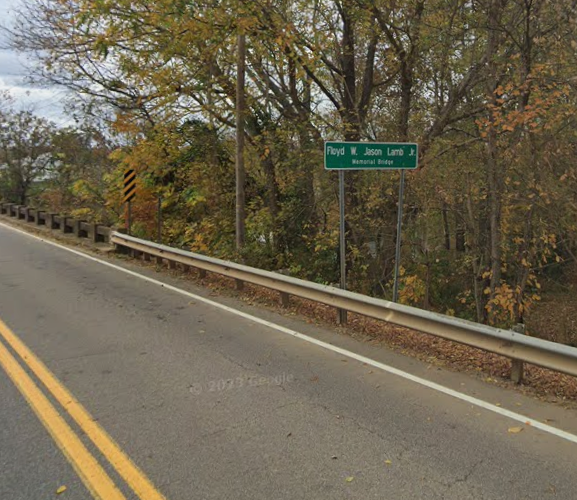 Ribbon cutting ceremony to mark the reopening of the Bailey Bridge